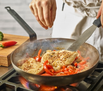 chef cooking chicken brand photography by Stephen Conroy food photographer